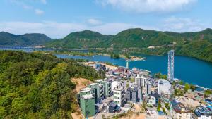 an aerial view of a city next to a river at Gapyeong Boreum-Dal Poolvilla in Gapyeong