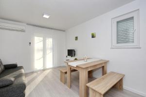 TV a/nebo společenská místnost v ubytování Apartman Antonio