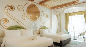 a hotel room with two beds in a room at HOTEL VAN GOGH in Candon