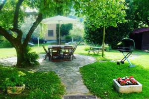 Vonkajšia záhrada v ubytovaní Apartment Piccolo Borgo