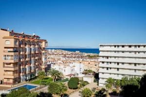 arial view of a city with buildings and the ocean at Espanhouse Vera Torreblanca in Torrevieja