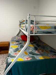 a bunk bed in a room with a bunk bedutenewayangering at Villa Pinzon in Moià +4 photos