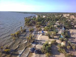 an aerial view of a beach with trees and water at Fort Banya Resort in Eliye