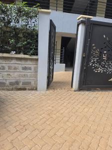 two doors in front of a building at Crane Suites in Eldoret