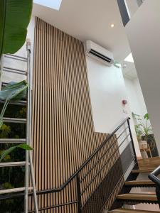 a staircase in a house with a heater on the wall at Espace entier Centre de Paris in Paris