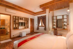Postel nebo postele na pokoji v ubytování BB Angkor Residence