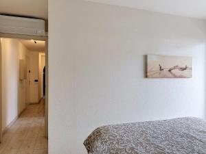 Postel nebo postele na pokoji v ubytování EM LIFE Strasbourg + 5 fotografií