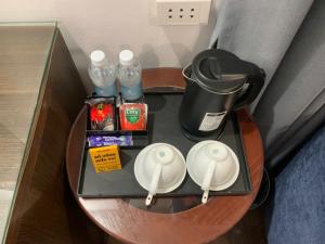 a table with water bottles on top of it at A25 Hotel - 57 Quang Trung in Hanoi
