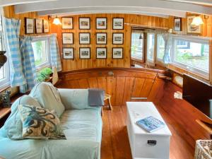 a living room with a couch and a table at The Prince - Uk42204 in Clachan of Glendaruel