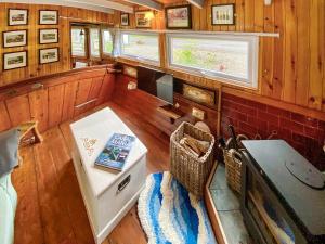 a small room with a table and a tv in it at The Prince - Uk42204 in Clachan of Glendaruel