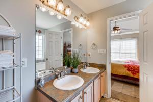 a bathroom with two sinks and a large mirror at Birmingham Haven New Deck King Bed No Cleaning Fee in Birmingham +28 photos