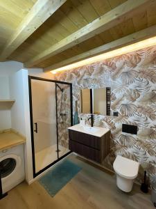 a bathroom with a sink and a mirror at Verde & Mar in Castro-Urdiales +34 photos