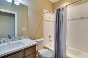 a bathroom with a sink and a toilet and a shower at Home w/ Golf Course, Mountain Views & EV Charging! in Peyton +36 photos