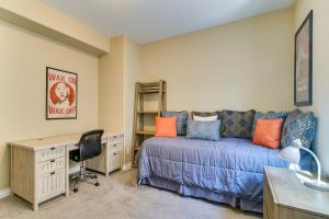 a bedroom with a bed and a desk at Home w/ Golf Course, Mountain Views & EV Charging! in Peyton