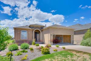 a house with a garage in a yard at Home w/ Golf Course, Mountain Views & EV Charging! in Peyton