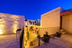 a view of a balcony of a house at night at Old Town Urfa in Urfa
