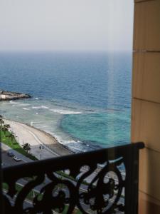 a view of the ocean from a balcony at Rosewood Jeddah in Jeddah