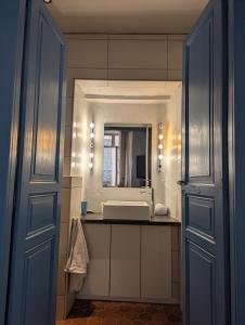 a bathroom with a sink and a mirror at The Artist's House in Céret +38 photos