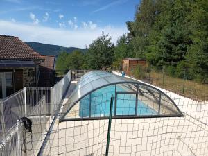 a glass dome on top of a house at Auberge de la Belette in Le Monestier