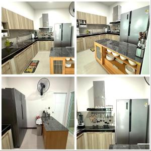 a kitchen with a stainless steel refrigerator and a counter at My friend private pool villa in Samut Songkhram