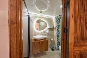 a bathroom with a sink and a mirror at Old Town Urfa in Urfa +99 photos