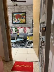 a view of a living room through a door at Casa Mamá Tere in Pantoja