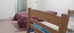 a bedroom with two bunk beds in a room at Yuntasuma II in San Fernando del Valle de Catamarca