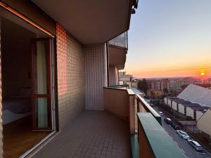 a balcony of a building with a view of a city at Bellavista Apartment Arcore in Arcore