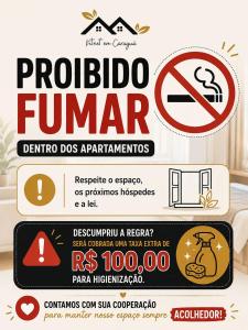 a sign that warns of a problem in a kitchen at Loft central perto da praia in Caraguatatuba +12 photos