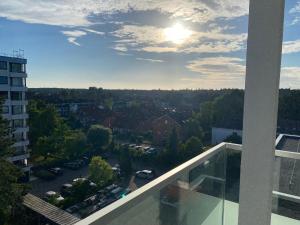 a view of a city from the balcony of a building at Ferienwohnung Ostseeverliebt 1-6-1 in Kellenhusen