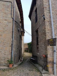 an alley in an old stone building at Albergue de Ruesta in Ruesta