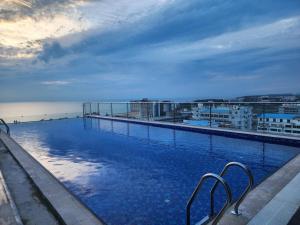a large swimming pool on top of a building at Hotel Windy Terrace in Cox's Bazar
