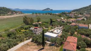 an aerial view of a town with the ocean at Karavaki apartments in Keri