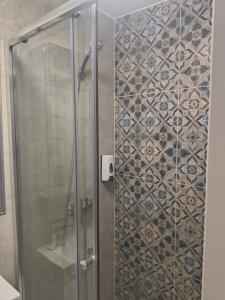 a shower with a glass door in a bathroom at Przy Żelaznym Moście in Kłodzko +35 photos