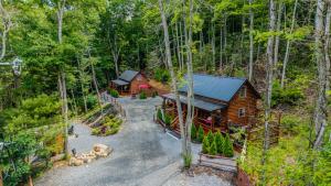 an overhead view of a cabin in the woods at Starry Nights in the Smokey Mountains with Hot Tub Pet Friendly Cabin A in Elizabethton