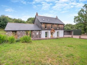 an old stone house with a large yard at 3 Bed in Brecon oc-92320 in Llandeilor-Fan