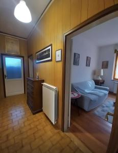 a room with a living room with a couch at La Cascinassa in Tagliolo Monferrato