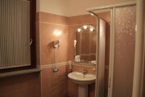 Kúpeľňa v ubytovaní Albergo Verdi + 16 fotografií