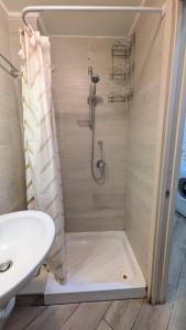 a bathroom with a shower and a sink at Mare oltre in Castellammare di Stabia