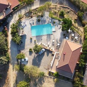 an aerial view of a house with a swimming pool at Villa Malandrino Guest House in Agropoli +42 photos