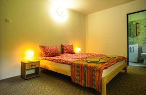 เตียงในห้องที่ Zsuzsilak +3 ภาพ