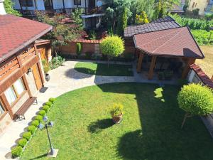 an aerial view of a garden with a gazebo at Guest House Ivan in Bansko