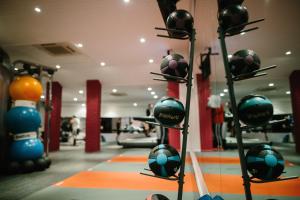 a gym with a rack of helmets on display at Bryn Meadows Golf, Hotel & Spa in Blackwood