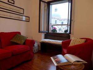 A seating area at B&b Vista sul Canal Grande