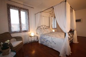 A bed or beds in a room at B&b Vista sul Canal Grande