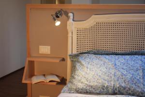 A bed or beds in a room at B&b Vista sul Canal Grande