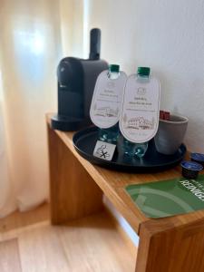 two bottles of detergent sitting on top of a table at Franz - Josef in Emmingen-Liptingen