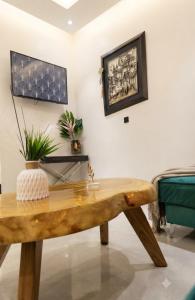 a wooden coffee table in a living room at Halil Bey Luxury Apartments in Kavála
