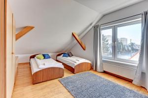 Posteľ alebo postele v izbe v ubytovaní Nice Rooms - Pokoje Gościnne