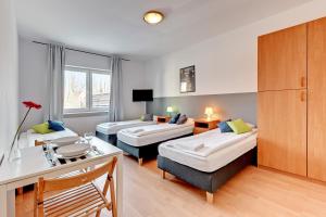 Posteľ alebo postele v izbe v ubytovaní Nice Rooms - Pokoje Gościnne